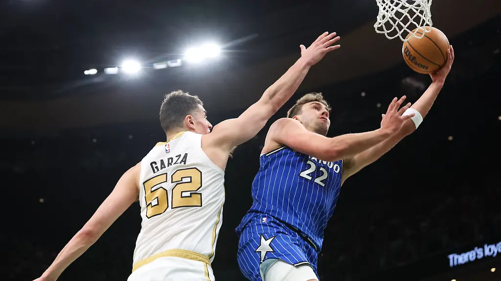 Apr-12-2026-Boston-Massachusetts-USA-Orlando-Magic-forward-Franz-Wagner-22-shoots-defended-by-Boston-Celtics-forward-Luka-Garza-52-during-the-first-half-at-TD-Garden