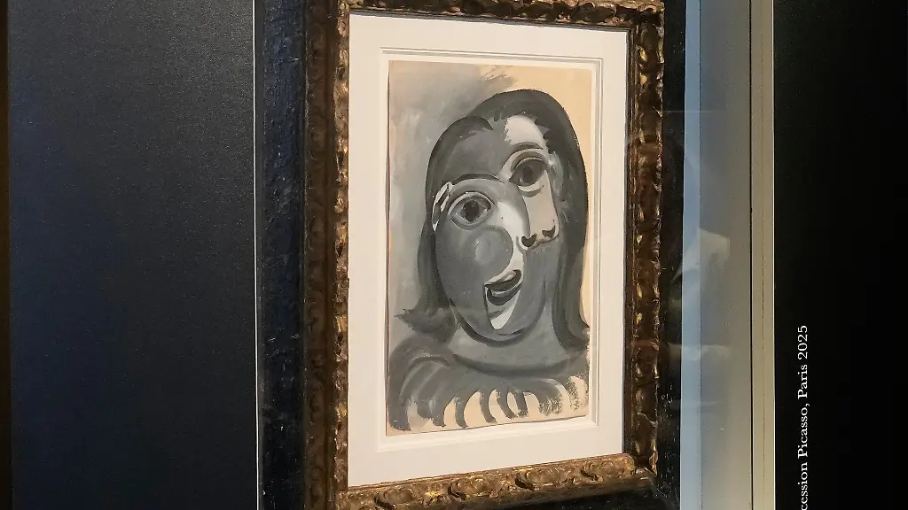 The-Head-of-a-Woman-by-Pablo-Picasso-painted-in-1941-is-presented-in-Paris-Friday-April-10-2026-where-the-draw-will-be-handled-by-auction-house-Christie-s-next-week