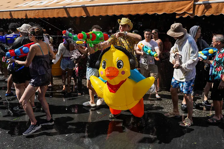Foreign-tourists-and-Thai-revelers-participate-in-the-water-battle-to-celebrate-the-annual-Songkran-festival-the-Thai-traditional-New-Year-celebrations-also-known-as-the-water-festival-at-the-tourist-spot-Khao-San-Road-in-Bangkok-Thailand-on-April-12-2026