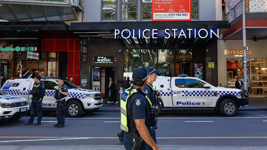 April-5-2025-Melbourne-Victoria-State-Australia-A-general-view-of-the-police-station-near-the-protest-march-Protesters-in-Melbourne-are-calling-for-action-against-President-Donald-Trumpas-policies-particularly-his-corporate-influence-discriminatory-practices-and-stance-on-the-Gaza-situation-As-Trump-returns-to-power-activists-in-Australia-are-concerned-about-the-implications-for-U-S-foreign-policy-and-Australiaas-involvement-in-the-AUKUS-defense-pact-Prime-Minister-Anthony-Albanese-has-criticized-Trumpas-imposition-of-a-10-tariff-on-Australian-goods-denouncing-it-as-an-unfriendly-move-Additionally-debates-continue-over-distributing-the-Goods-and-Services-Tax-GST-with-some-states-like-Western-Australia-receiving-a-disproportionate-share-raising-concerns-about-fairness-in-fiscal-policies
