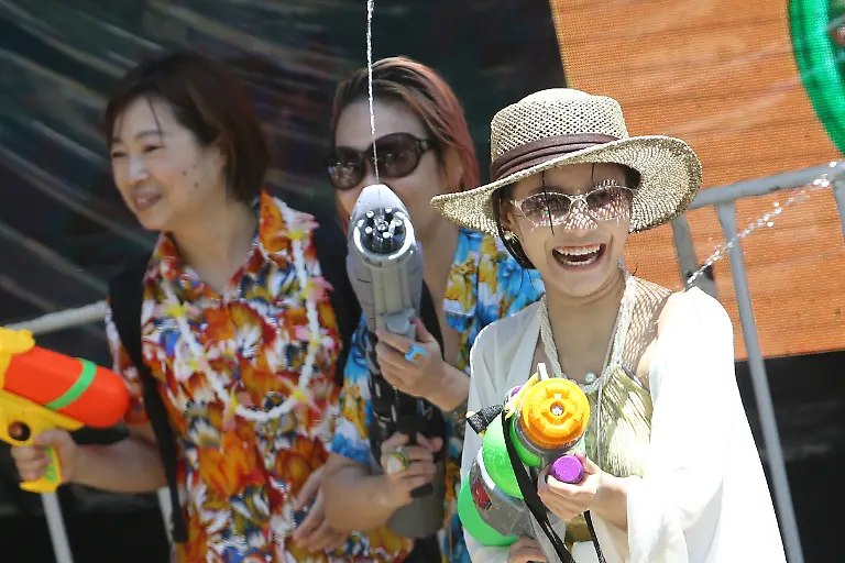 260413-BANGKOK-April-13-2026-Xinhua-People-splash-water-in-celebration-of-the-Songkran-festival-in-Bangkok-Thailand-April-13-2026-Songkran-a-traditional-Thai-New-Year-festival-is-celebrated-from-April-13-to-15-this-year-during-which-people-express-greetings-by-splashing-water-on-each-other