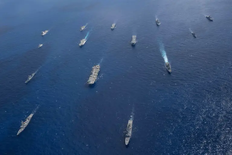 July-20-2025-Coral-Sea-U-S-Navy-ships-from-the-America-Strike-Group-led-by-the-forward-deployed-amphibious-assault-ship-USS-America-LHA-6-sail-in-formation-with-Royal-Australian-Navy-Republic-of-Korea-Navy-Royal-New-Zealand-Navy-French-Navy-and-Japan-Maritime-Self-Defense-Force-as-part-of-Talisman-Sabre-25-July-20-Talisman-Sabre-is-the-largest-bilateral-military-exercise-between-Australia-and-the-USA-advancing-a-free-and-open-Indo-Pacific-by-strengthening-relationships-and-interoperability-among-key-allies-and-partners-while-enhancing-our-collective-capabilities-to-respond-to-a-wide-array-of-potential-security-concerns-Credit-Image-U-S