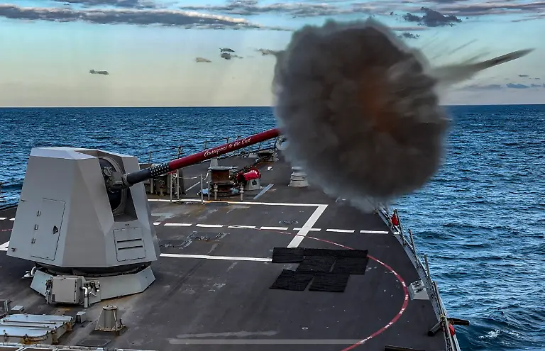 Handout-photo-dated-July-23-2023-shows-The-Arleigh-Burke-class-guided-missile-destroyer-USS-Rafael-Peralta-DDG-115-fires-its-Mark-45-5-inch-gun-during-a-live-fire-exercise-as-part-of-Exercise-Talisman-Sabre-in-the-Coral-Sea-July-23-2023-Large-wargames-between-the-USA-Australia-and-eleven-partner-nations-kicked-off-on-July-21-the-largest-ever-in-the-history-of-Exercise-Talisman-Sabre-U-S-Navy-photo-by-Mass-Communication-Specialist-2nd-Class-Colby-A-Mothershead-via-ABACAPRESS
