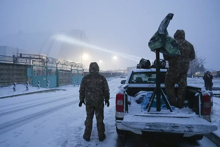Ukrainian-serviceman-stands-on-a-vehicle-with-anti-aircraft-gun-after-a-drone-attack-at-the-former-Chernobyl-nuclear-power-plant-Ukraine-Friday-Feb-14-2025