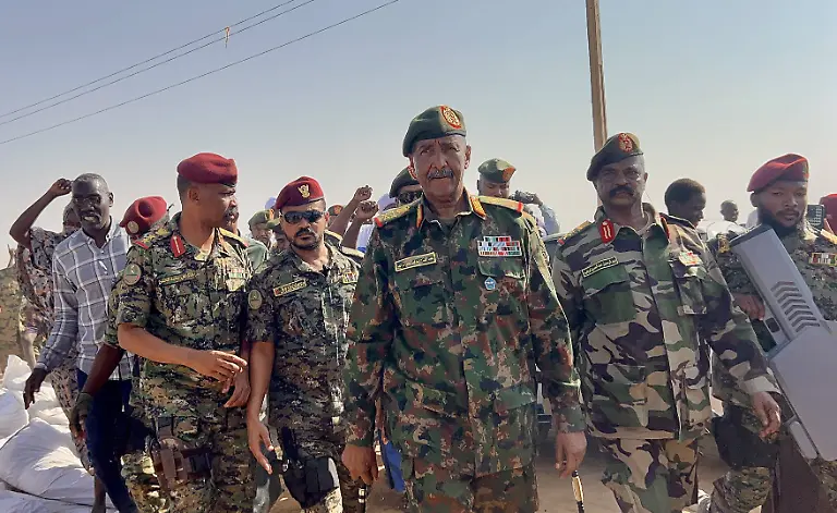 Sudans-Sovereign-Council-head-Burhan-visits-displaced-citizens-at-El-Afadh-Camp-AL-DABBAH-SUDAN-NOVEMBER-8-Sudans-Sovereignty-Council-Chairman-and-Army-Commander-Gen-Abdel-Fattah-al-Burhan-visits-the-newly-established-Al-Afadh-camp-in-Al-Dabbah-Northern-State-where-tens-of-thousands-of-Sudanese-have-taken-refuge-after-being-displaced-by-clashes-following-the-Rapid-Support-Forces-takeover-of-El-Fasher-the-capital-of-North-Darfur-on-October-26-in-Al-Dabbah-Sudan-on-November-8-2025-Stringer-Anadolu-Al-Dabbah-Sudan-Editorial-use-only-Please-get-in-touch-for-any-other-usage