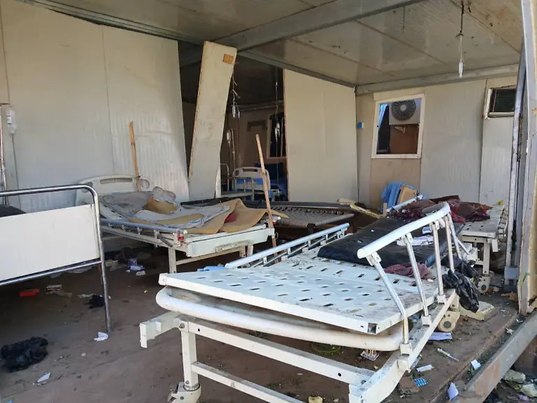 241213-EL-FASHER-Dec-13-2024-This-photo-taken-with-a-mobile-phone-on-Dec-13-2024-shows-a-view-of-the-Saudi-hospital-after-a-missile-attack-in-El-Fasher-the-capital-city-of-North-Darfur-State-in-western-Sudan-Nine-people-were-killed-and-more-than-20-others-injured-on-Friday-in-a-missile-attack-by-the-paramilitary-Rapid-Support-Forces-RSF-on-a-hospital-in-El-Fasher-according-to-a-local-government-official
