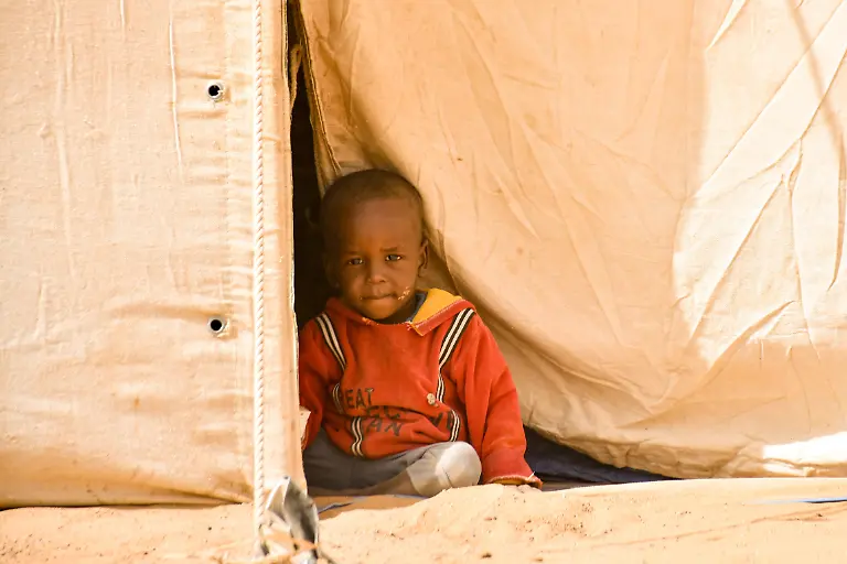AL-DABBAH-SUDAN-JANUARY-13-A-Sudanese-child-is-seen-in-the-Al-Afad-Refugee-Camp-home-to-thousands-of-people-displaced-from-regions-including-El-Fasher-the-capital-of-North-Darfur-as-well-as-other-parts-of-Darfur-and-Kordofan-in-Sudan-on-January-13-2026