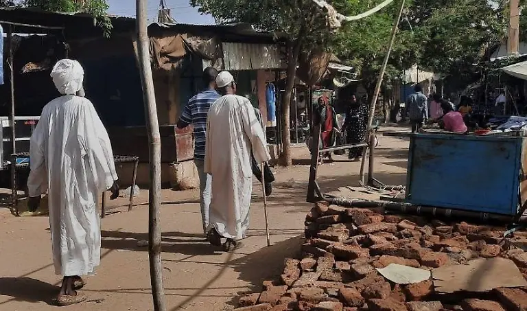 Daily-Life-in-Sudan-DARFUR-SUDAN-JUNE-06-People-visit-street-market-in-the-Darfur-region-of-Sudan-on-June-06-2023-Darfur-residents-try-to-contribute-their-families-by-selling-their-crops-at-local-markets-as-the-governor-of-Sudans-western-Darfur-region-has-declared-the-area-a-disaster-zone-amid-killings-and-looting-The-Sudanese-army-and-the-paramilitary-Rapid-Support-Forces-RSF-have-reached-a-new-72-hour-ceasefire-agreement-Darfur-Sudan-Editorial-use-only-Please-get-in-touch-for-any-other-usage
