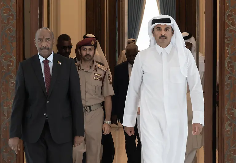 DOHA-QATAR-SEPTEMBER-07-EDITORIAL-USE-ONLY-MANDATORY-CREDIT-AMIRI-DIWAN-OF-THE-STATE-OF-QATAR-HANDOUT-NO-MARKETING-NO-ADVERTISING-CAMPAIGNS-DISTRIBUTED-AS-A-SERVICE-TO-CLIENTS-Qatari-Amir-Sheikh-Tamim-Bin-Hamad-Al-Thani-R-meets-with-Chairman-of-the-Sudanese-Sovereignty-Council-and-Sudan-s-army-chief-Gen-Abdel-Fattah-al-Burhan-L-in-Doha-Qatar-on-September-07-2023