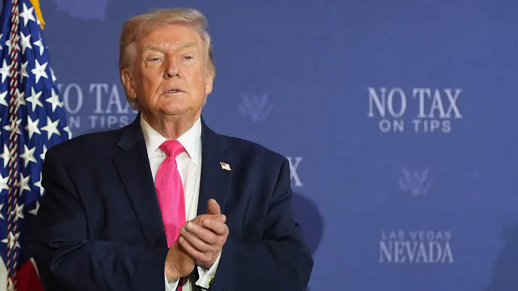 President-Donald-Trump-stands-on-stage-at-a-roundtable-event-about-no-tax-on-tips-Thursday-April-16-2026-in-Las-Vegas