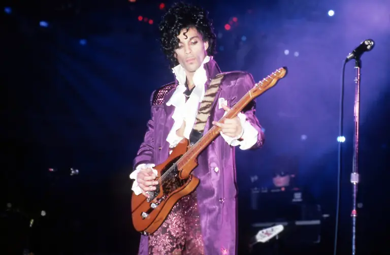 DETROIT-MI-NOVEMBER-4-American-singer-songwriter-musician-record-producer-dancer-actor-and-filmmaker-Prince-1958-2016-performs-onstage-during-the-1984-Purple-Rain-Tour-on-November-4-1984-at-the-Joe-Louis-Arena-in-Detroit-Michigan