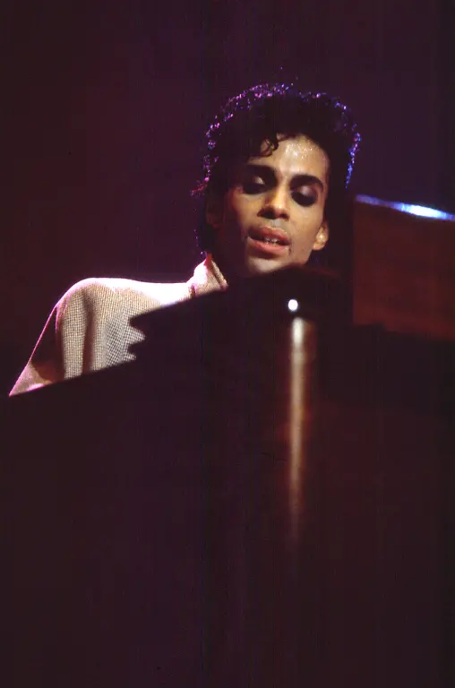 American-musician-Prince-1958-2016-plays-piano-as-he-performs-onstage-at-Madison-Square-Garden-during-the-Hit-N-Run-leg-of-his-Parade-world-tour-New-York-New-York-August-3-1986