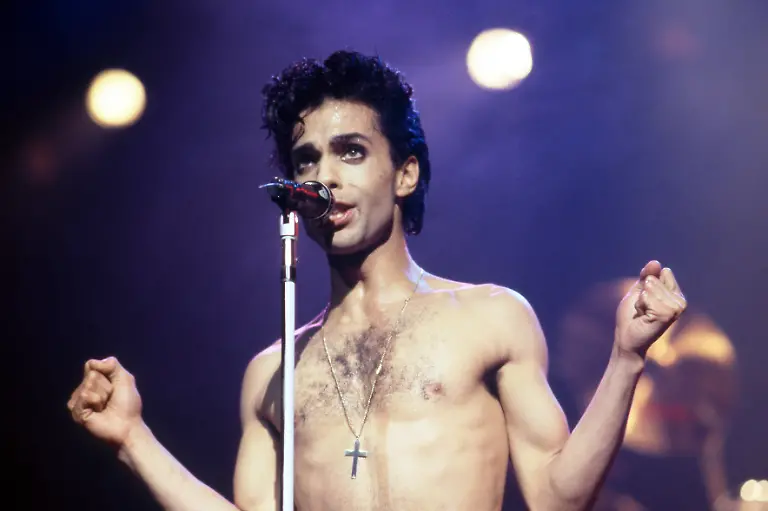 DETROIT-MI-JUNE-7-American-singer-Prince-1958-2016-performs-on-stage-during-the-1986-Parade-Tour-on-June-7-1986-at-the-Cobo-Arena-in-Detroit-Michigan