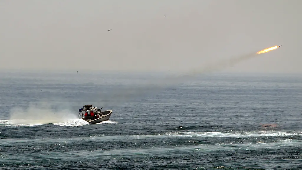 An-Iranian-boat-fires-a-missile-as-it-takes-part-in-a-naval-war-game-in-the-Persian-Gulf-and-the-Strait-of-Hormuz-southern-Iran-April-22-2010-Iran-s-Revolutionary-Guards-successfully-deployed-a-new-speed-boat-capable-of-destroying-enemy-ships-as-war-games-began-on-Thursday-in-a-waterway-crucial-for-global-oil-supplies-Iranian-media-reported-REUTERS-Fars-News-IRAN-Tags-MILITARY-POLITICS-QUALITY-FROM-SOURCE-FOR-EDITORIAL-USE-ONLY