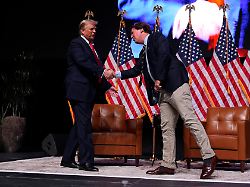 Republican Presidential Nominee Former President Donald Trump Speaks With Tucker Carlson During A Tucker Carlson Live Tour Show At Desert Diamond Arena Thursday Oct 31 2024 In Glendale Ariz