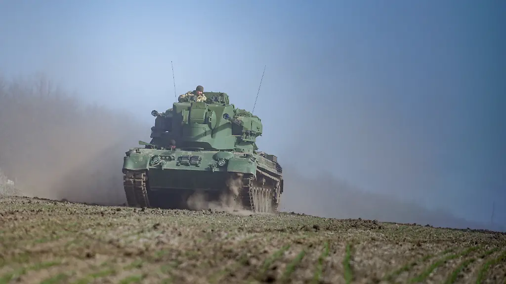 22-February-2024-Ukraine-Odessa-A-Gepard-anti-aircraft-gun-tank-and-its-crew-drive-across-a-field-east-of-Odessa-The-tank-supplied-by-Germany-is-used-here-to-defend-against-enemy-drones-aircraft-and-helicopters-24-02-2024-marks-the-second-anniversary-of-the-start-of-Russia-s-war-of-aggression-against-Ukraine