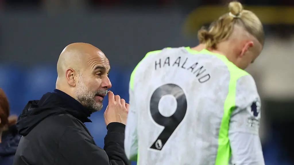 Soccer-Football-Premier-League-Burnley-v-Manchester-City-Turf-Moor-Burnley-Britain-Prill-22-2026-Manchester-City-manager-Pep- Guardiola-dhe-Erling-Haaland-festojnë-pas-ndeshjes-REUTERS-Scott-Heppell-EDITORIAL-PERDORIMI-VETËM-JO-PERDORIM-ME-AUDI-TË PAAUTORIZUARA O-VIDEO-DATA-FIXTURE-LISTAT-KLUB-LIGA-LOGOS-OR-SHËRBIMET LIVE-ONLINE-NE-MATCH-PERDORIMI-KUFIZUAR-NE-120-IMAGES-NO-VIDEO-EMULATION-NO -PERDORIMI-NE-BAST-LOJRA-OR-LIGË-LIGË-LOJTAR-VETËM-KLUBOR-PUBLIKIME- KONTAKTONI-PERFAQESUESIN-LLOGARIA-TUAJ-PER-DETAJE-TE METEJSHME