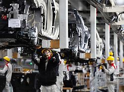 FILE PHOTO File Photo Employees Work At The Car Production Line During Organized Media Tour At The Chinese Automaker GWM Great Wall Motor Plant In Baoding Hebei Province China November 24 2025