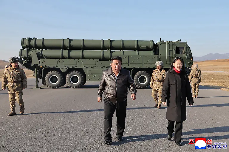 N-Korea-test-fires-large-caliber-multiple-rocket-launcher-North-Korean-leader-Kim-Jong-un-C-accompanied-by-his-daughter-Ju-ae-inspects-a-test-firing-of-an-upgraded-large-caliber-multiple-rocket-launcher-system-to-assess-its-effectiveness-at-an-unspecified-location-on-Jan-27-2026-in-this-photo-released-by-the-North-s-official-Korean-Central-News-Agency-the-next-day-South-Korea-s-military-has-said-it-detected-multiple-short-range-ballistic-missiles-launched-from-north-of-Pyongyang-toward-the-East-Sea-For-Use-Only-in-the-Republic-of-Korea