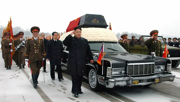 PYONGYANG-North-Korea-File-photo-shows-Kim-Jong-Un-C-front-son-of-the-late-North-Korean-leader-Kim-Jong-Il-saluting-as-he-walks-beside-a-hearse-carrying-the-coffin-of-the-elder-Kim-in-Pyongyang-on-Dec-28-2011-The-younger-Kim-s-uncle-Jang-Song-Thaek-behind-Kim-Jong-Un-then-vice-chairman-of-the-National-Defense-Commission-is-also-present-Jang-was-executed-Dec-12-2013-after-being-accused-of-attempting-to-overthrow-the-regime
