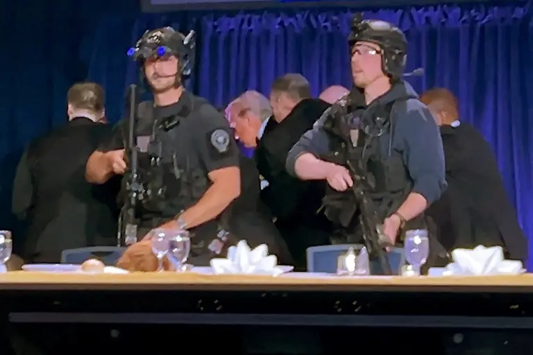 U-S-President-Donald-Trump-is-escorted-out-after-a-man-opened-fire-with-a-shotgun-on-security-personnel-outside-the-room-during-the-annual-White-House-Correspondents-Association-dinner-in-Washington-D-C-U-S-April-25-2026-in-this-still-image-from-video-REUTERS-Bo-Erickson-THIS-IMAGE-WAS-PROCESSED-BY-REUTERS-TO-ENHANCE-QUALITY-AN-UNPROCESSED-VERSION-HAS-BEEN-PROVIDED-SEPARATELY