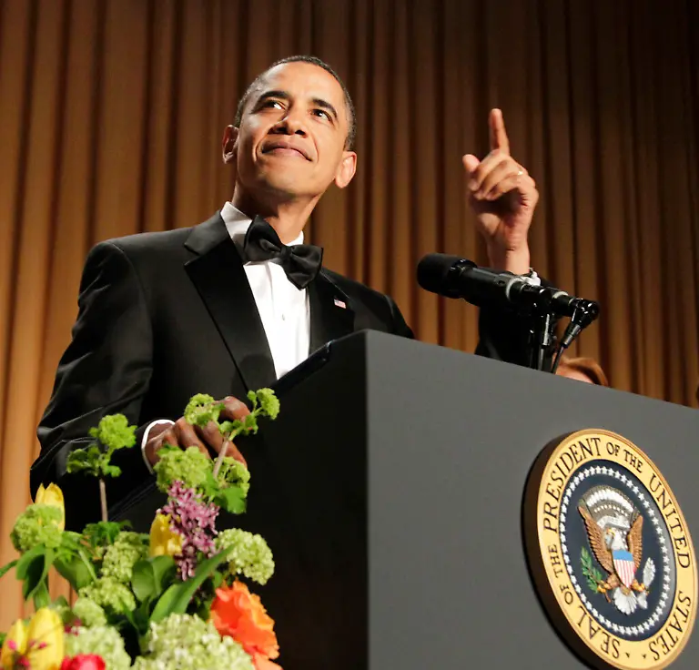 President-Barack-Obama-points-to-the-video-screen-as-he-starts-his-speech-at-the-White-House-Correspondents-Association-Dinner-in-Washington-Saturday-April-30-2011