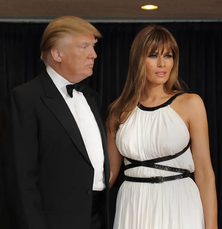 Real-estate-magnate-and-billionaire-Donald-Trump-and-his-wife-Melania-pose-for-photographers-on-the-red-carpet-arriving-for-the-annual-White-House-Correspondent-s-Association-dinner-April-30-2011-in-Washington-D-C-President-Obama-will-attend-the-dinner-which-combines-the-administration-s-top-officials-Capitol-Hill-politicians-and-Hollywood-glitz-and-glamour