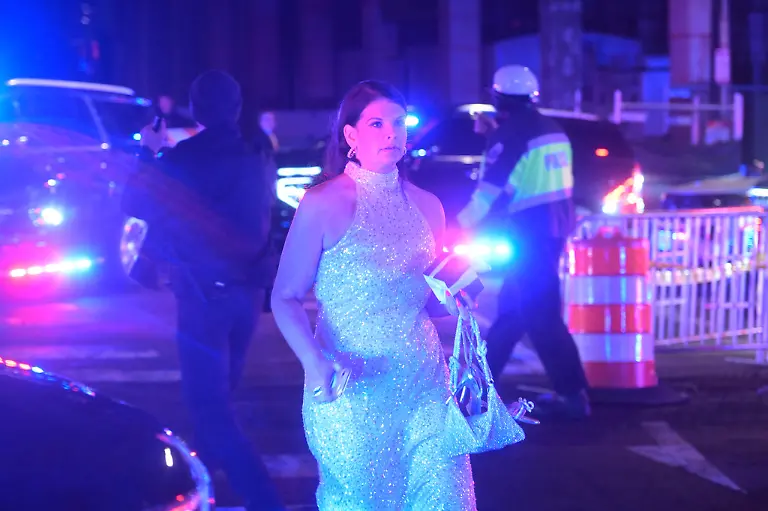 A-guest-leaves-the-White-House-Correspondents-Dinner-Saturday-April-25-2026-in-Washington-AP-Photo-Rod-Lamkey-Jr