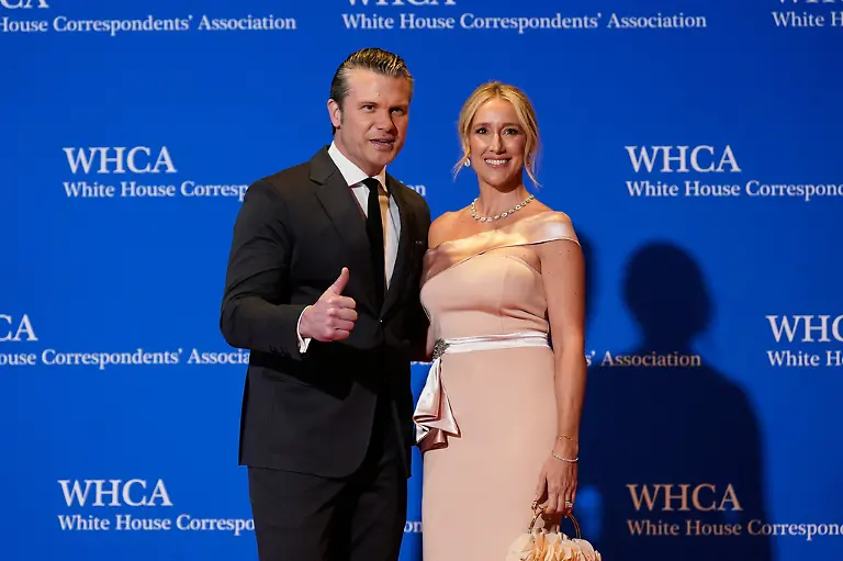 Defense-Secretary-Pete-Hegseth-and-his-wife-Jennifer-Rauchet-pose-for-photographers-at-the-annual-White-House-Correspondents-Association-Dinner-Saturday-April-25-2026-in-Washington