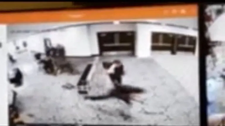 Law-enforcement-personnel-react-as-a-man-armed-with-a-shotgun-tries-to-breach-security-at-the-venue-of-the-White-House-Correspondents-Association-dinner-in-Washington-D-C-U-S-April-25-2026-in-this-screengrab-from-a-CCTV-footage-DONALD-J-TRUMP-via-Truth-Social-Handout-via-REUTERS-THIS-IMAGE-HAS-BEEN-SUPPLIED-BY-A-THIRD-PARTY-NO-RESALES-NO-ARCHIVES-MANDATORY-CREDIT-VERIFICATION-Reuters-was-able-to-verify-the-location-from-flooring-and-windows-that-match-corroborating-footage-Date-confirmed-from-the-government-statement-of-the-incident-No-old-results-were-posted-online-before-April-25-FBI-confirmed-that-National-Capital-Response-Squad-has-responded-to-a-shooting-at-the-Washington-Hilton-and-added-that-the-subject-is-in-custody