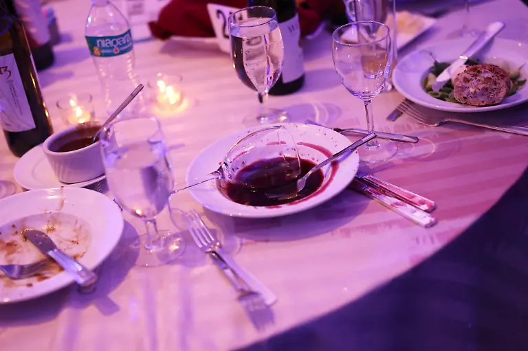 An-abandoned-wine-glass-sits-in-a-bowl-after-an-incident-occurred-at-the-White-House-Correspondents-Dinner-at-the-Washington-Hilton-Saturday-April-25-2026-in-Washington