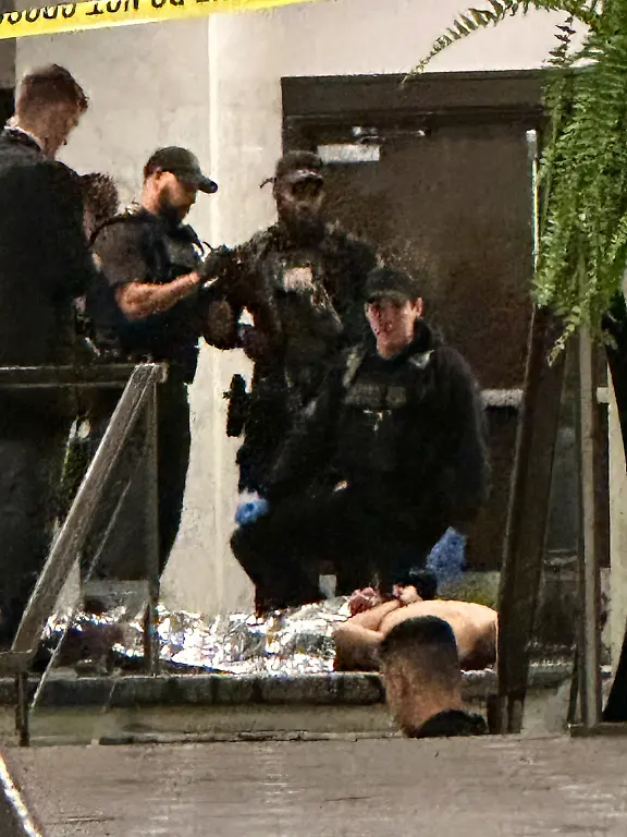 Members-of-law-enforcement-control-shooting-suspect-Cole-Tomas-Allen-during-the-White-House-Correspondents-Dinner-Saturday-April-25-2026-in-Washington