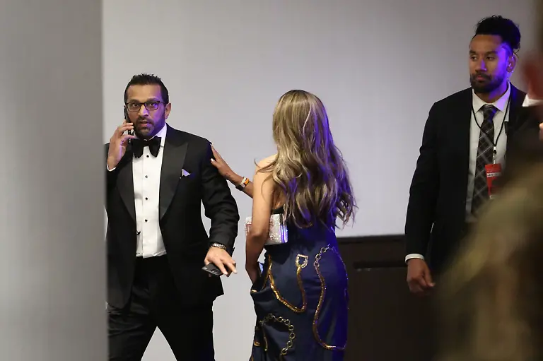 FBI-director-Kash-Patel-talks-on-the-phone-during-the-White-House-Correspondents-Dinner-Saturday-April-25-2026-in-Washington