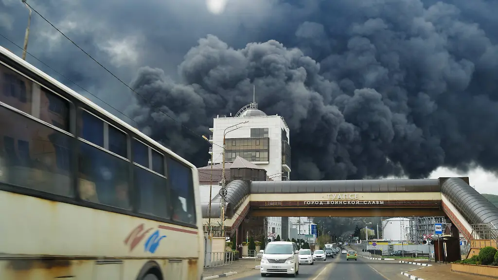 Russia-Oil-Refinery-Fire-9148864-21-04-2026-Smoke-rises-from-a-fire-at-the-Tuapse-Oil-Terminal-in-Tuapse-Krasnodar-Territory-Russia-According-to-Russian-officials-a-massive-drone-attack-on-the-night-of-April-20-targeted-the-city-of-Tuapse-on-the-shores-of-the-Black-Sea-damaging-transport-infrastructure-at-the-port-and-setting-oil-product-storage-tanks-on-fire-One-person-was-killed-and-another-injured-More-than-200-rescuers-were-called-in-to-extinguish-the-blaze
