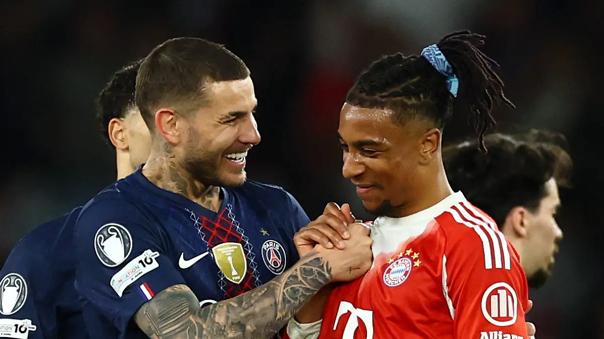 Soccer-Football-UEFA-Champions-League-Semi-Final-First-Leg-Paris-St-Germain-v-Bayern-Munich-Parc-des-Princes-Paris-France-April-28-2026-Paris-St-Germain-s-Lucas-Hernandez-and-Bayern-Munich-s-Michael-Olise-after-the-match-REUTERS-Sarah-Meyssonnier