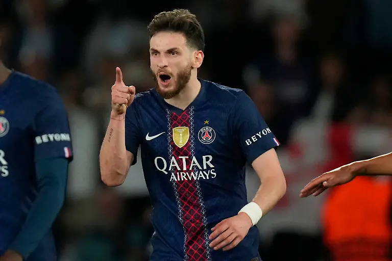 PSG-s-Khvicha-Kvaratskhelia-celebrates-after-scoring-his-side-s-fourth-goal-during-the-Champions-League-semifinal-first-leg-soccer-match-between-Paris-Saint-Germain-and-Bayern-Munich-in-Paris-Tuesday-April-28-2026