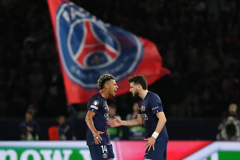 PSG-s-Khvicha-Kvaratskhelia-right-celebrates-with-Desire-Doue-after-scoring-his-side-s-first-goal-during-a-Champions-League-semifinal-first-leg-soccer-match-between-Paris-Saint-Germain-and-Bayern-Munich-in-Paris-Tuesday-April-28-2026