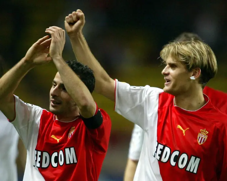 FC-Monaco-s-Jerome-Rothen-R-celebrates-with-a-team-mate-after-their-soccer-Champions-league-match-against-Deportivo-la-Coruna-at-Charle-II-Stadium-in-Monaco-Tuesday-5-November-2003-Monaco-won-8-3