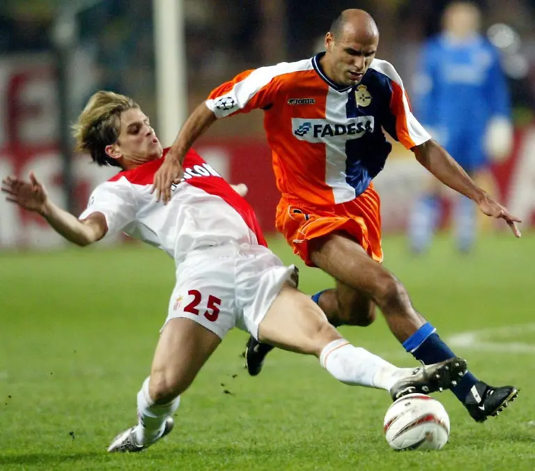 AS-Monaco-s-Jerome-Rothen-L-fights-for-the-ball-with-Deportivo-la-Coruna-s-Manuel-Pablo-during-their-soccer-Champions-League-match-at-Charle-II-Stadium-in-Monaco-Tuesday-5-November-2003