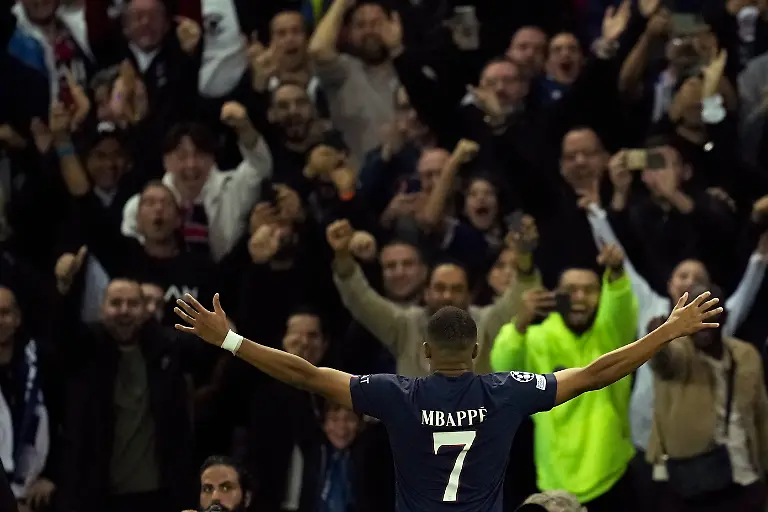 PSG-s-Kylian-Mbappe-celebrates-after-scoring-his-side-s-second-goal-during-the-Champions-League-Group-H-soccer-match-between-Paris-Saint-Germain-and-Maccabi-Haifa-at-the-Parc-des-Princes-stadium-in-Paris-France-Tuesday-Oct-25-2022