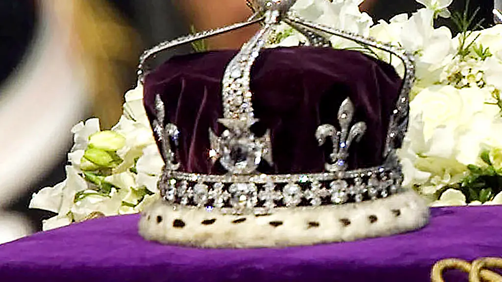 FILE-In-this-April-5-2002-file-photo-The-Koh-i-noor-or-mountain-of-light-diamond-set-in-the-Maltese-Cross-at-the-front-of-the-crown-made-for-Britain-s-late-Queen-Mother-Elizabeth-is-seen-on-her-coffin-as-it-is-drawn-to-London-s-Westminster-Hall-Britain-s-Camilla-the-queen-consort-will-not-to-use-the-the-Koh-i-noor-diamond-in-her-coronation-crown-Rather-than-commission-a-new-crown-as-is-customary-Camilla-will-modify-Queen-Mary-s-crown-using-diamonds-from-Queen-Elizabeth-II-s-personal-collection-the-palace-said-in-a-statement-Tuesday-Feb-14-2023