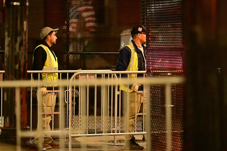 Security-preparations-take-place-outside-the-White-House-in-Washington-United-States-on-April-26-2026-Workers-set-up-multiple-layers-of-barricades-and-security-cordons-for-the-United-Kingdom-State-Visit-as-United-States-Secret-Service-agents-observe-This-follows-an-attempted-assassination-of-United-States-President-Donald-Trump-by-suspect-Cole-Allen-at-the-White-House-Correspondents-Association-Dinner