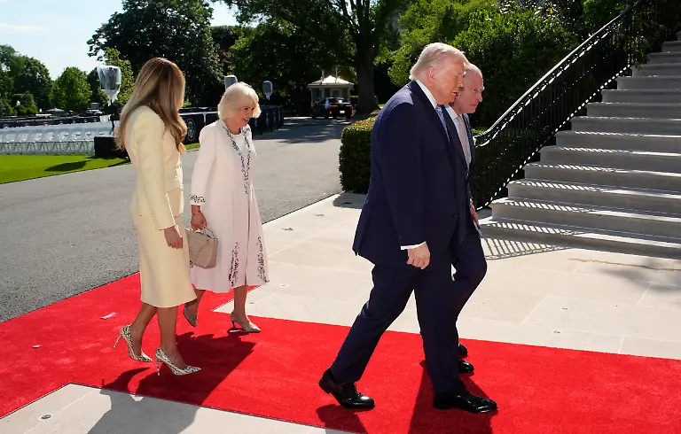 US-President-Donald-Trump-and-First-lady-Melania-Trump-greet-Britains-King-Charles-and-Queen-Camilla-at-the-White-House-South-Portico-in-Washington-on-March-27-2026