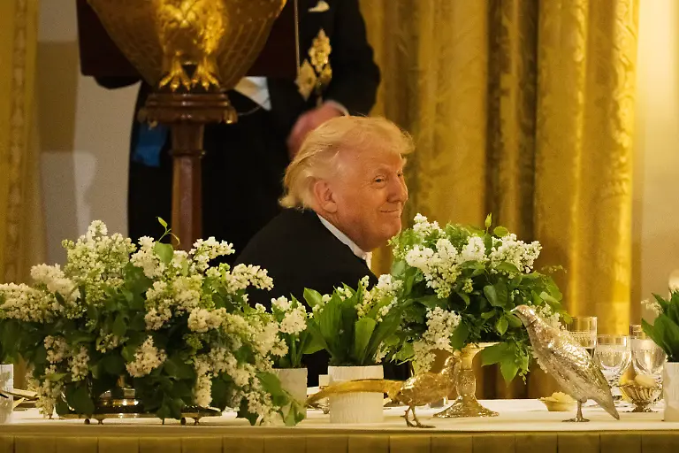 WASHINGTON-DC-APRIL-28-President-Donald-Trump-smiles-as-Great-Britains-King-Charles-gives-remarks-during-a-state-dinner-with-President-Donald-Trump-and-First-Lady-Melania-Trump-at-the-White-House-on-Tuesday-April-28-2026-in-Washington-D-C-Charles-spoke-to-a-joint-session-of-Congress-earlier-in-the-day-and-attended-several-events-with-U-S-President-Donald-Trump