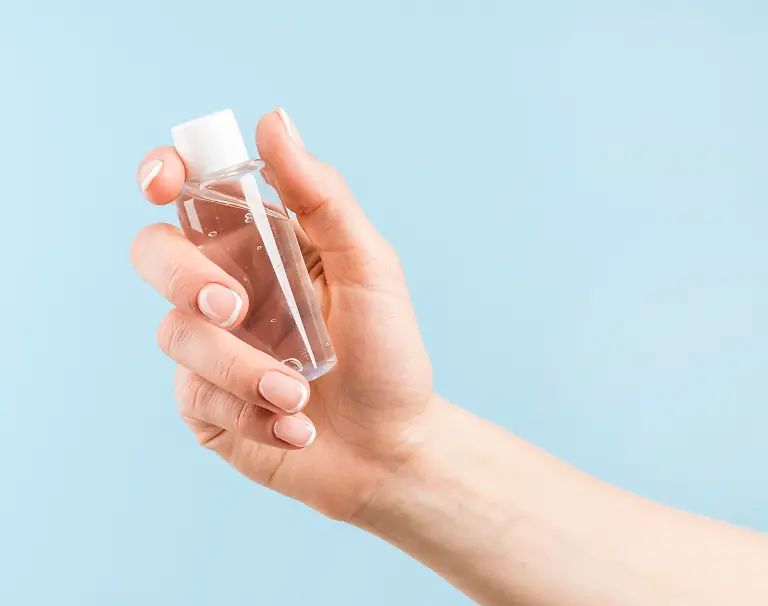 person-holding-disinfection-bottle