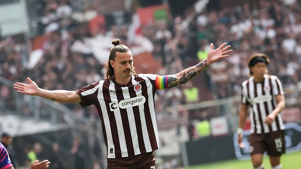 03-05-2026-Hamburg-Fussball-Maenner-Bundesliga-FC-St-Pauli-FSV-Mainz-05-32-Spieltag-Millerntor-Stadion-Jackson-Irvine-FC-St-Pauli-reagiert-auf-dem-Platz-Foto-Christian-Charisius-dpa-WICHTIGER-HINWEIS-Gemaess-den-Vorgaben-der-DFL-Deutsche-Fussball-Liga-bzw-des-DFB-Deutscher-Fussball-Bund-ist-es-untersagt-in-dem-Stadion-und-oder-vom-Spiel-angefertigte-Fotoaufnahmen-in-Form-von-Sequenzbildern-und-oder-videoaehnlichen-Fotostrecken-zu-verwerten-bzw-verwerten-zu-lassen
