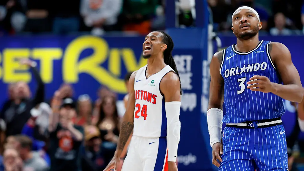 Detroit-Pistons-guard-Daniss-Jenkins-24-celebrates-after-sinking-a-three-point-basket-as-Orlando-Magic-center-Wendell-Carter-Jr-right-walks-away-during-the-fourth-quarter-in-Game-7-of-a-first-round-NBA-basketball-playoffs-series-Sunday-May-3-2026-in-Detroit