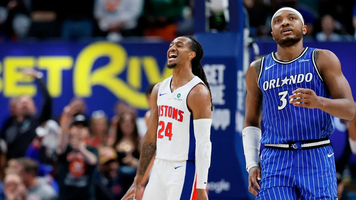 Detroit-Pistons-guard-Daniss-Jenkins-24-celebrates-after-sinking-a-three-point-basket-as-Orlando-Magic-center-Wendell-Carter-Jr-right-walks-away-during-the-fourth-quarter-in-Game-7-of-a-first-round-NBA-basketball-playoffs-series-Sunday-May-3-2026-in-Detroit