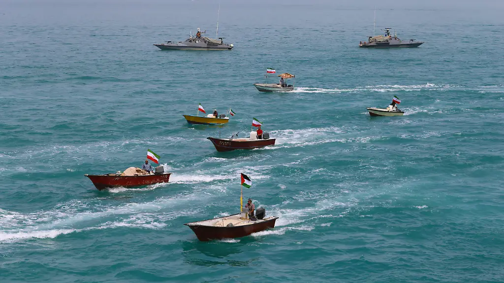 Iran-Bushehr-Persian-Gulf-Coast-Iranian-speedboats-of-the-Basij-Resistance-Mobilization-Force-a-paramilitary-volunteer-militia-within-the-Islamic-Revolutionary-Guard-Corps-IRGC-and-one-of-its-five-branches-are-sailing-along-the-Persian-Gulf-during-the-IRGC-marine-parade-to-commemorate-Persian-Gulf-National-Day-near-the-Bushehr-nuclear-power-plant-in-the-seaport-city-of-Bushehr-Persian-Gulf-Iran-on-April-29-2024-Iran-celebrates-the-anniversary-of-the-liberation-of-the-country-s-south-from-Portuguese-occupation-in-1622-as-Persian-Gulf-National-Day-in-Bushehr-on-April-29-2024-The-date-coincides-with-the-anniversary-of-a-successful-military-campaign-by-Shah-Abbas-the-Great-of-Persia-in-the-17th-century