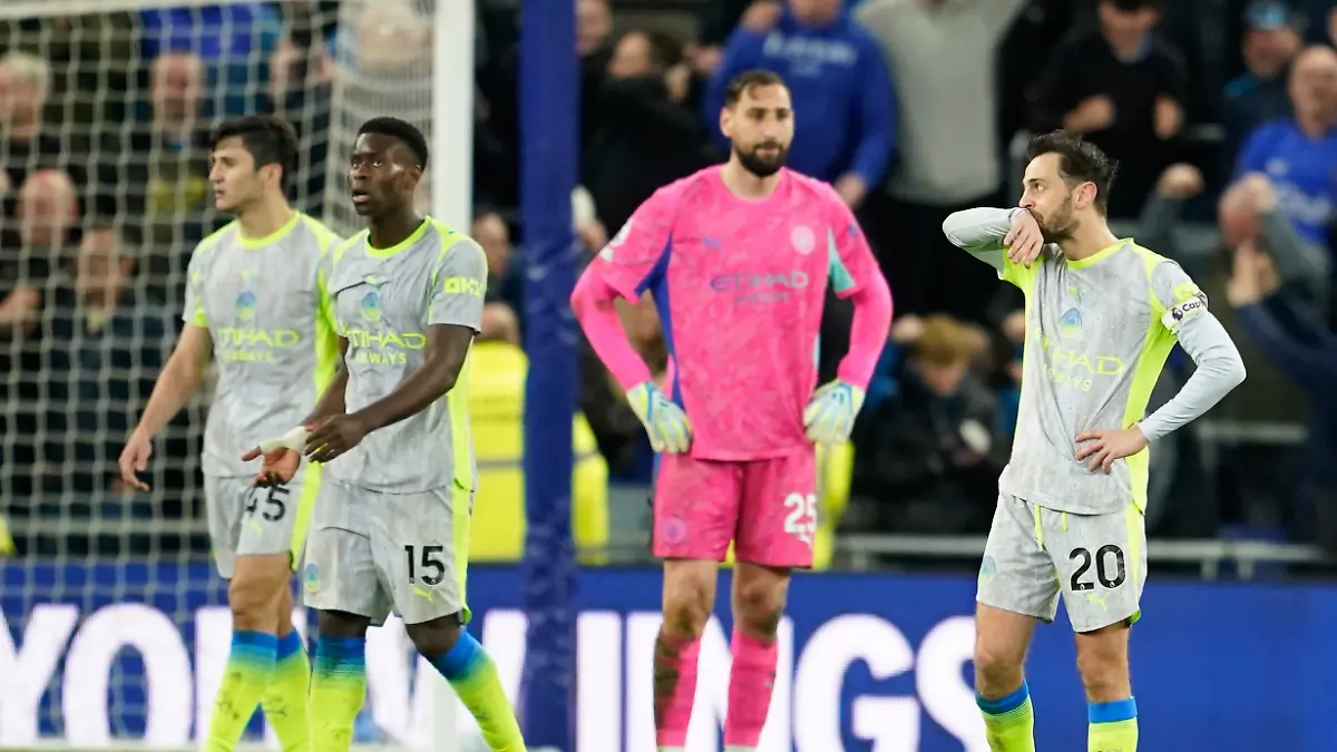 Manchester-City-players-stand-dejected-during-the-Premier-League-soccer-match-between-Manchester-City-and-Everton-in-Liverpool-England-Monday-May-4-2026